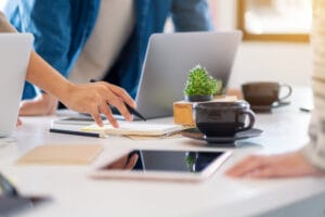Group Businessman Using Laptop Computer While Discussing Writing Notebook Table Office