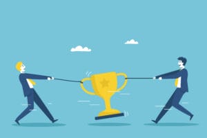 Business Competition Concept. Two Businessman Tug Snatching Trop